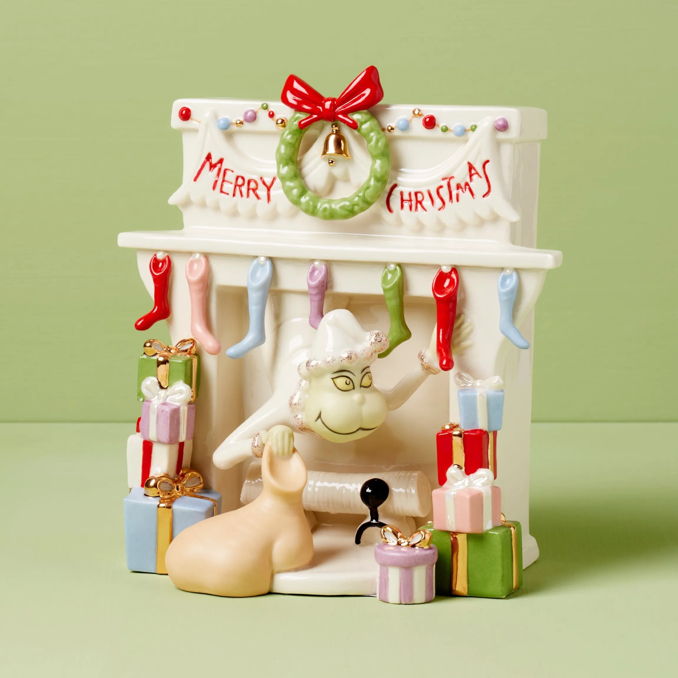Grinch Stealing Stockings Figurine