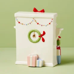 Grinch Stealing Stockings Figurine